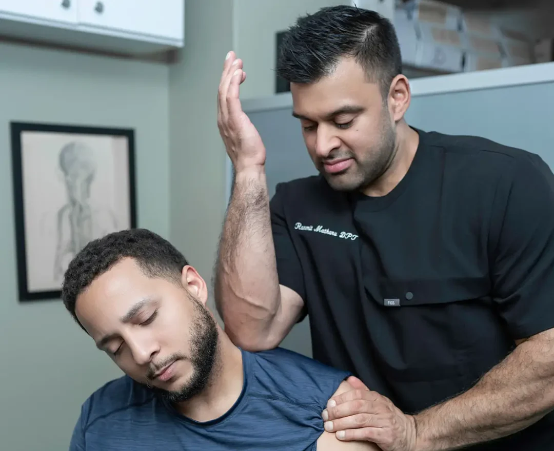 Dr. Ranmit Singh, DPT, working with a patient in the Upper West Side clinic